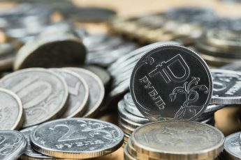 background-blurry-out-of-focus-bokeh-and-pasteurization-coins-of-the-russian-ruble-on-the-table-the-change-in-the-exchange-rate-of-the-ruble-idea-for-economic-news-banner