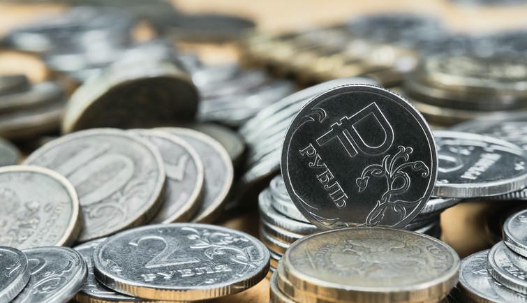 background-blurry-out-of-focus-bokeh-and-pasteurization-coins-of-the-russian-ruble-on-the-table-the-change-in-the-exchange-rate-of-the-ruble-idea-for-economic-news-banner