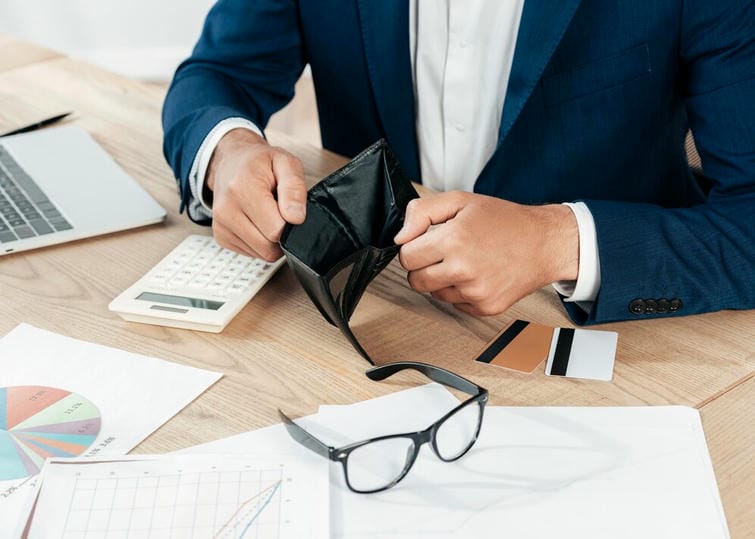 close-up-hands-holding-wallet_23-2148773966